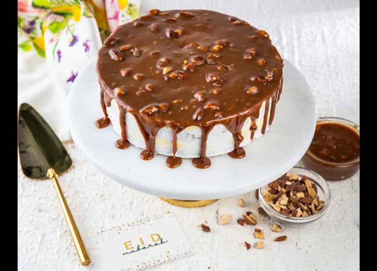 Chocolate drip cake with nut topping